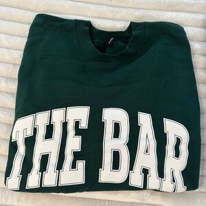 THE BAR oversized varsity green sweatshirt with white text M